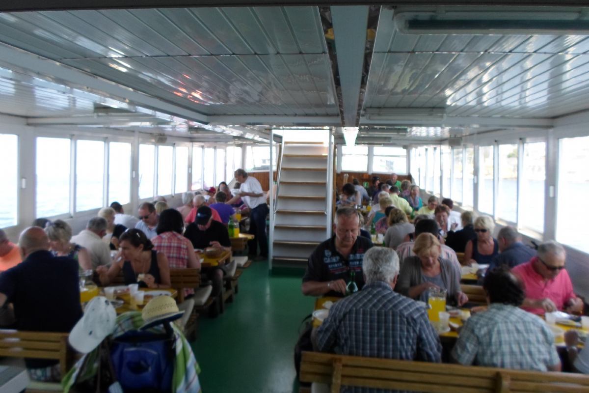 Boat excursion with a fish picnic